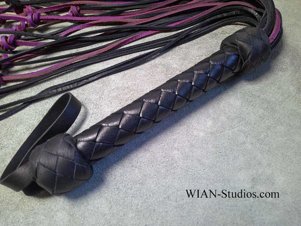 Knotty Cat with Purple and Black Tails