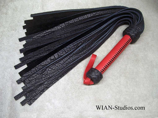 Black Buffalo Flogger on a Wider Red Bullhide laced handle