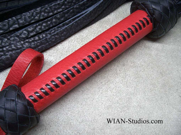 Black Buffalo Flogger on a Wider Red Bullhide laced handle